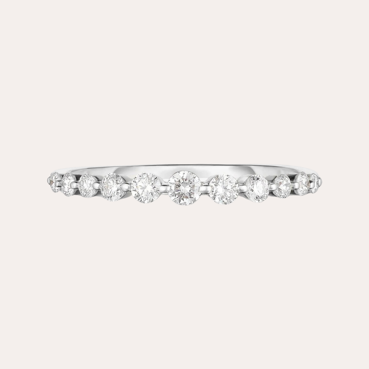 Graduated Single Prong Diamond Ring